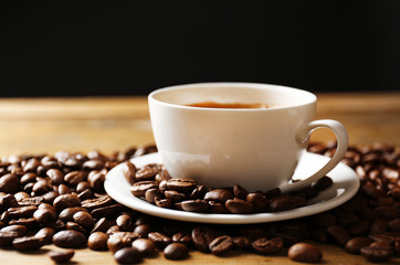 Cup of coffee on wooden table