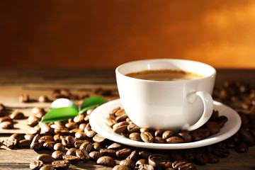 Cup of coffee on wooden table