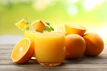 Glass of orange juice and slices