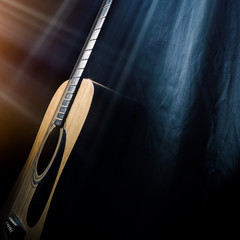 Naklejka premium guitar on a black background