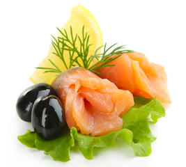 Sliced and rolled salmon, black olive and herbs isolated