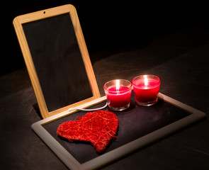 candle , roses , a blackboard