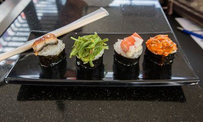 Sushi on wooden block