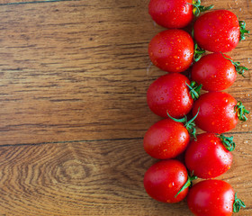 tomatoes on a wooden background