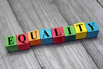 word equality on colorful wooden cubes