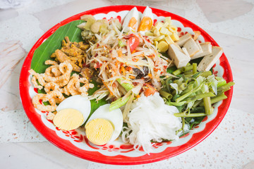 Green papaya salad in tray