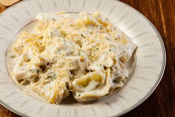 Italian tortellini in cream sauce