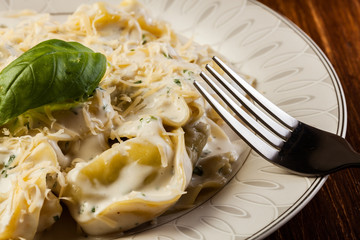 Italian tortellini in cream sauce