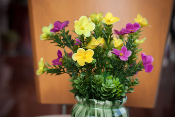 Plastic flower in vase