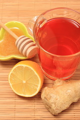 Cup of healthy tea with honey ginger and lemon