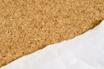 White wrinkle paper on cork background