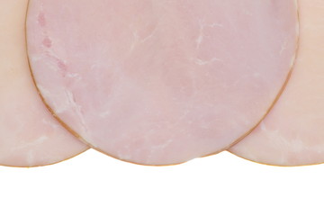 Fresh sliced roast ham isolated on white background