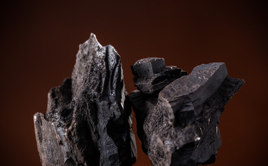Coal lumps on dark background