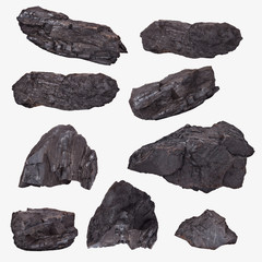 Coal lumps spilled on white
