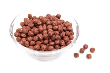 Bowl with chocolate cereal on white background
