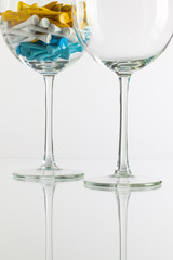 Two glasses of wine and golf equipments