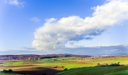 Naklejka premium landscape with acre and blue sky at Ronneburg, Hesse