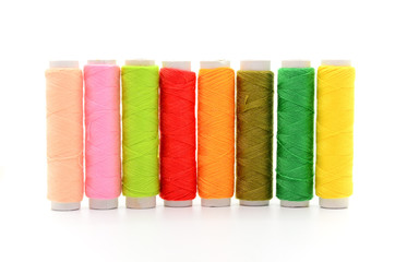 Set of colorful spools of thread