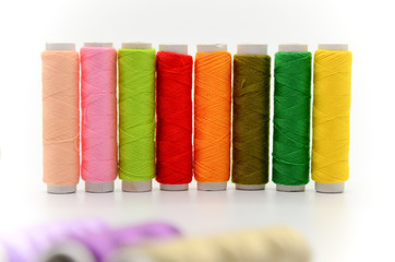 Set of colorful spools of thread