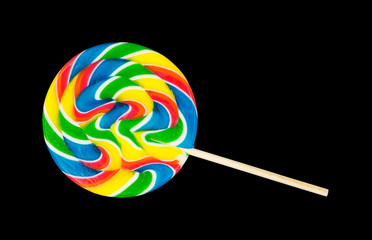 Single lollipop on a black background