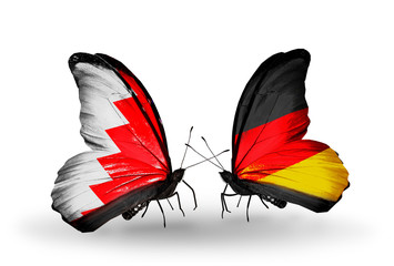 Two butterflies with flags Bahrain and Germany