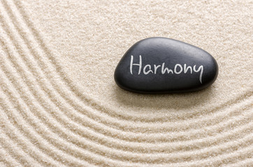 Black stone with the inscription Harmony