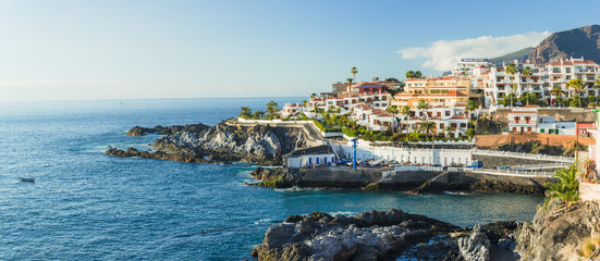 Naklejka premium Panorama La Caleta fishing village on the coast of Tenerife isla