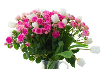 bunch of  fresh pink roses and white tulips close up