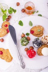 Delicious goat cheese with honey, walnut and crackers on an old