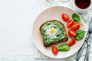 sandwich baked with spinach, cream cheese and egg