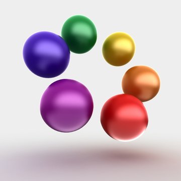 colorful glossy balls on gray