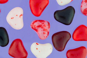 Close Up of Colorful Valentine Candies on Purple