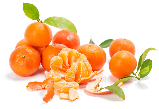 mandarins or clementines with segments with leaves