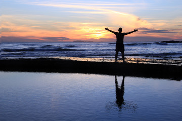 Male silhouette at sunset.
