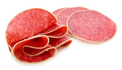 Slices of salami isolated on white background