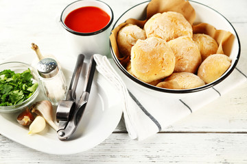 Fresh homemade bread buns from yeast dough with fresh garlic