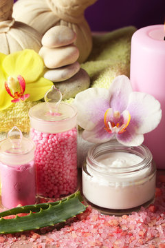 Fototapeta Spa treatments with orchid flower, close-up