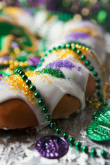 Mardi Gras: Traditional King Cake With Beads And Coins