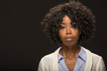 Young African American black woman serious angry face