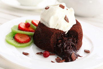 Hot chocolate pudding with fondant centre with ice-cream,