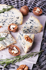 Blue cheese with sprigs of rosemary and nuts