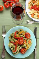 Tasty pasta with pepper, carrot and tomatoes