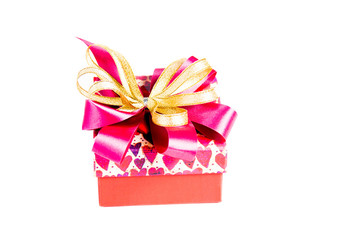 Gold gift box with  ribbon and bow isolated