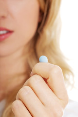 Woman with pill