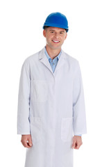 Man in a lab coat and helmet