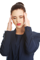 Young woman suffering a headache