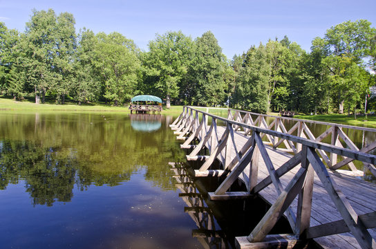 wooden brigde on resort lake water