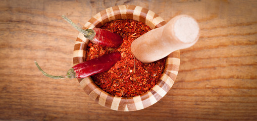 paprika powder spices in mortar
