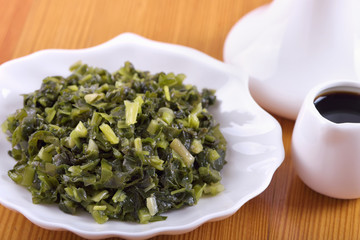 Appetizer of marinated wild garlic