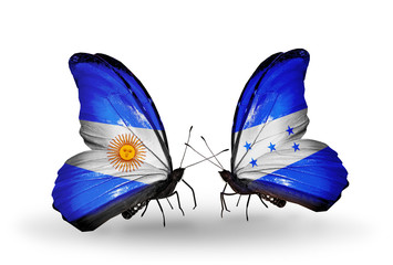 Two butterflies with flags Argentina and Honduras